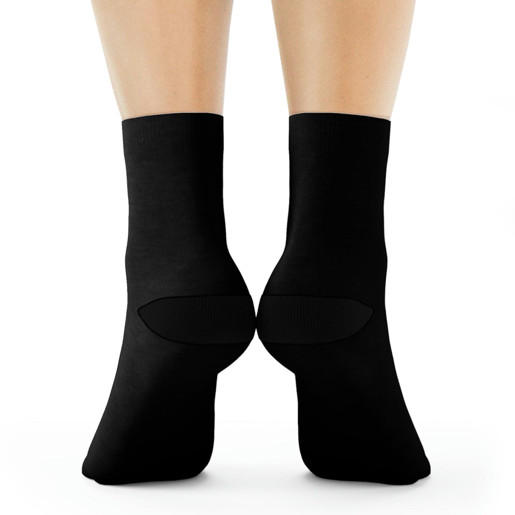 black pair of sublimated socks with Made Inc Signature